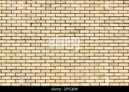 Light Yellow Brick Wall Pattern Background From a Distance Stock Photo