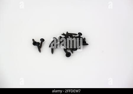 Self-driving black screws set isolated on white background Stock Photo
