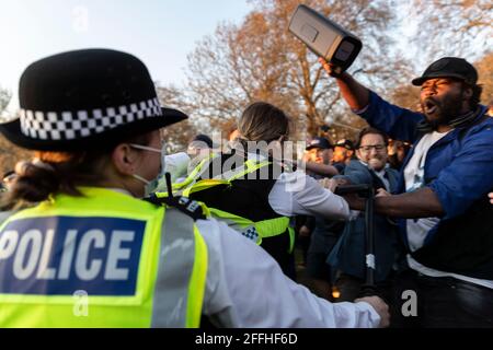 London, UK. 24th Apr, 2021. Police and protesters clash after the protest at Hyde Park in London on April 24, 2021.People called online to a flash mob-style mass gathering against vaccine passport, face masks and lockdown. The government aims to provide official proof of vaccination for millions of British holidaymakers this summer ''“ starting as early as 17 May. Credit: May James/ZUMA Wire/Alamy Live News Stock Photo