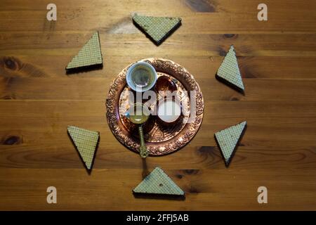 Turkish Coffee in Traditional Copper Pot and Cup with waffles. Stock Photo