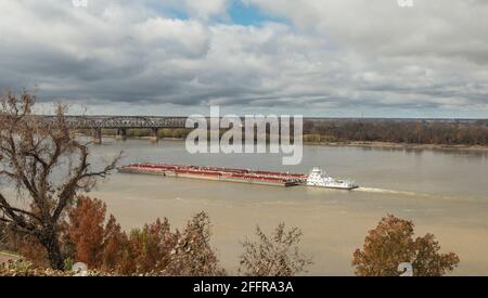 Mississippi River at Vicksburg has thousands of tons of grain past below it's bridges Stock Photo