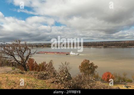 Mississippi River at Vicksburg has thousands of tons of grain past below it's bridges Stock Photo