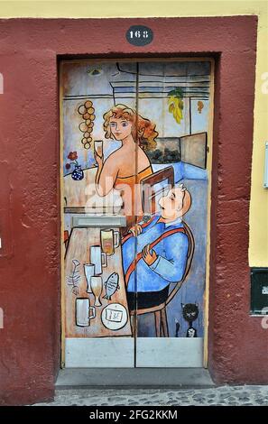 Murals painted as part of the Art of the Open Doors project in the Zona Velha (Old Town) area of Funchal, Madeira Stock Photo