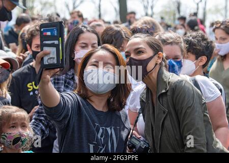 NEW YORK, NY - APRIL 24: Rep. Alexandria Ocasio-Cortez (D-NY) poses with supporters after speaking at an Earth Day Celebration in Astoria Park on April 24, 2021 in the Astoria neighborhood of the Queens borough of New York City.   Congresswoman Ocasio-Cortez joined by New York State Senator Jessica Ramos and New York Assembly Member Zohran Mamdani for remarks about the NRG Energy, Inc proposal for the Astoria power plant. Credit: Ron Adar/Alamy Live News Credit: Ron Adar/Alamy Live News Stock Photo