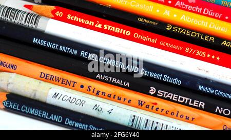 Some famous names in art pencils: colouring pencils lined up in the artist's tray Stock Photo