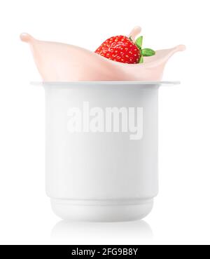 strawberry falling in plastic cup with yogurt Stock Photo