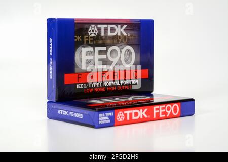 PRAGUE, CZECH REPUBLIC - NOVEMBER 29, 2018: Audio compact cassette TDK FE 90 Ferric. Audio cassette on a white background, front, rwo cassettes. analo Stock Photo