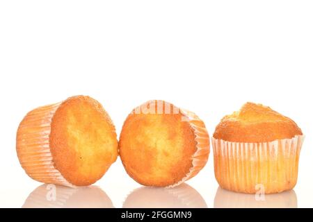 Three tasty sweet muffins, close-up, on a white background Stock Photo