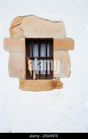 Vintage window with piece of bread Stock Photo
