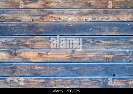 wooden boards background. aged burned black and blue wooden planks Stock Photo