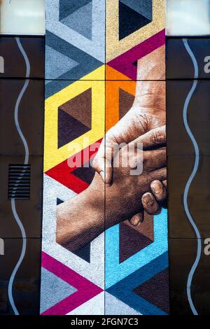 Detail of a large-scale mural on a building in New Inn Yard and King John Court, Shoreditch, East London, UK Stock Photo