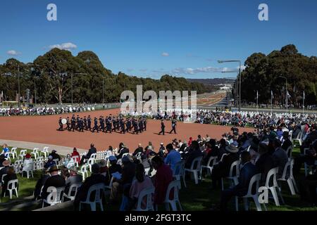 Canberra, Australia. 25th Apr, 2021. An event marking the Anzac Day is held at the Australian War Memorial in Canberra, Australia, April 25, 2021. Australia has paused to pay tribute to those who have served the country in wars, conflicts and peacekeeping operations. Thousands of people across the country on Sunday morning attended dawn services to mark Anzac Day, the national day of remembrance for troops in Australia and New Zealand. Credit: Chu Chen/Xinhua/Alamy Live News Stock Photo