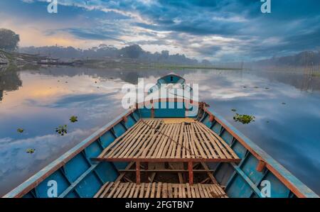 A small boat or troller is in river Stock Photo