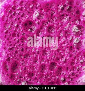 Pink foam with bubbles as a full-screen background. Square frame Stock Photo