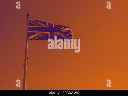 Duotone image of the British flag, the Union Jack seen flying in England UK in April, 2021. Stock Photo
