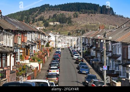 Tonypandy, Rhondda valley, Wales - April 2021: Traditional terraced homes on a street in Tonypandy in the Rhondda valley Stock Photo