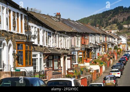 Tonypandy, Rhondda valley, Wales - April 2021: Traditional terraced homes on a street in Tonypandy in the Rhondda valley Stock Photo