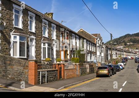 Tonypandy, Rhondda valley, Wales - April 2021: Traditional terraced homes on a street in Tonypandy in the Rhondda valley Stock Photo