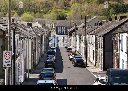 Rhondda valley, Wales - April 2021: Traditional terraced homes on a street in the Rhondda valley Stock Photo