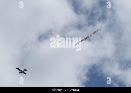 Leeds, UK. 25th Apr, 2021. A plane banner flies over Elland Road to protest against the club's owner Joel Glazer ahead of the Premier League match between Leeds United and Manchester United outside Elland Road, Leeds, United Kingdom. Credit: SPP Sport Press Photo. /Alamy Live News Stock Photo