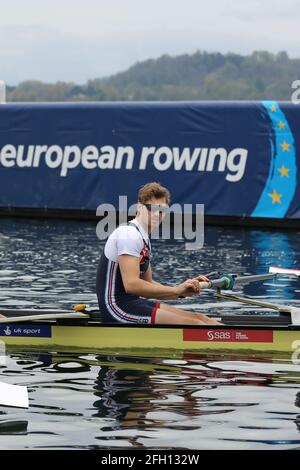 Rory Gibbs of Great Brtiain competes in the Men's Four Semifinal A/B 2 on Day 2 at the European Rowing Championships in Lake Varese on April 10th 2021 Stock Photo