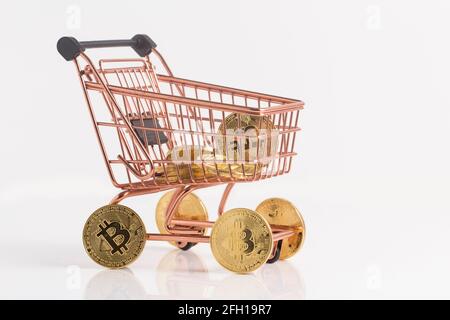 Copper Shopping cart with bitcoins, stock photo Stock Photo