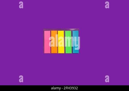set of sticky notes on a purple background Stock Photo