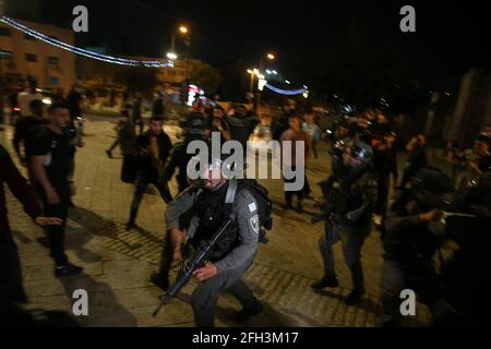 Jerusalem. 24th Apr, 2021. Members of the Israeli security forces react during clashes in east Jerusalem on April 24, 2021. Violent clashes recently broke out in east Jerusalem between Palestinian demonstrators and Israeli police forces. Credit: Muammar Awad/Xinhua/Alamy Live News Stock Photo