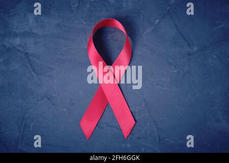 Dark blue ribbon awareness for aids day concept. World cancer day  background Stock Photo - Alamy