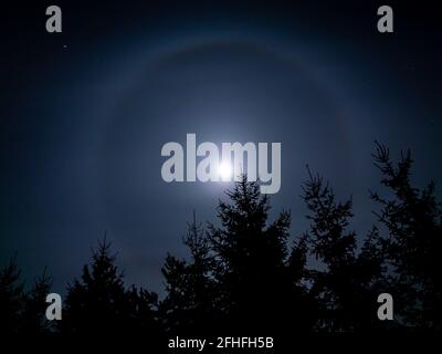 Halo light effect around the moon Stock Photo