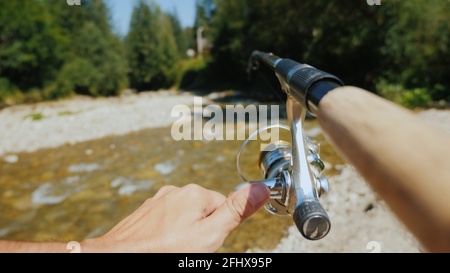 Fishing On A Small Mountain River In The Frame Of A Fisherman's Hand With A  Fishing Rod Free Stock Video Footage Download Clips Water