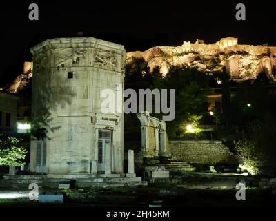 The Tower of the Winds under Acropolis, on the east side of the Roman Forum in Athens, is an octagonal Pentelic marble clock-tower. Stock Photo