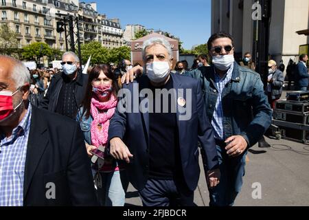 French singer Gaston Ghrenassia aka Enrico Macias (C) arrives as people gather to ask justice for late Sarah Halimi on Trocadero plaza in Paris on April 25, 2021. Halimi, a 65-year-old Orthodox Jewish woman, died in 2017 after being pushed out of the window of her Paris flat by neighbour Traore, 27, who shouted 'Allahu Akbar' ('God is great' in Arabic). Traore, a heavy cannabis smoker, has been in psychiatric care since Halimi's death and he remains there after the ruling. Photo by Raphael Lafargue/ABACAPRESS.COM Stock Photo