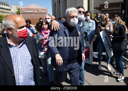 French singer Gaston Ghrenassia aka Enrico Macias (C) arrives as people gather to ask justice for late Sarah Halimi on Trocadero plaza in Paris on April 25, 2021. Halimi, a 65-year-old Orthodox Jewish woman, died in 2017 after being pushed out of the window of her Paris flat by neighbour Traore, 27, who shouted 'Allahu Akbar' ('God is great' in Arabic). Traore, a heavy cannabis smoker, has been in psychiatric care since Halimi's death and he remains there after the ruling. Photo by Raphael Lafargue/ABACAPRESS.COM Stock Photo