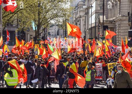 London, UK. 25th Apr, 2021. Protesters gather while holding Tigray flags during the demonstration. Thousands of people marched through Central London in protest of what the demonstrators call Ethiopia's and Eritrea's 'genocidal war' on the region of Tigray. Credit: SOPA Images Limited/Alamy Live News Stock Photo