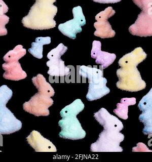 seamless pattern of colored bunnies isolated on a black background. High quality photo Stock Photo