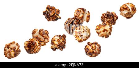 Falling chocolate popcorn isolated on white background Stock Photo