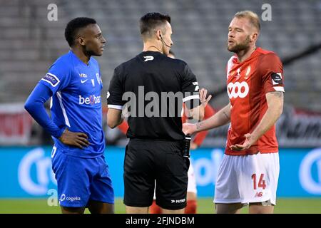 Genk's Jhon Lucumi Bonilla, referee Bram Van Driessche and Standard's Joao Klauss De Mello pictured during the 'Croky Cup' Belgian cup final between K Stock Photo