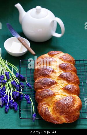 Challah made from yeast dough, a traditional festive dessert bread. Stock Photo