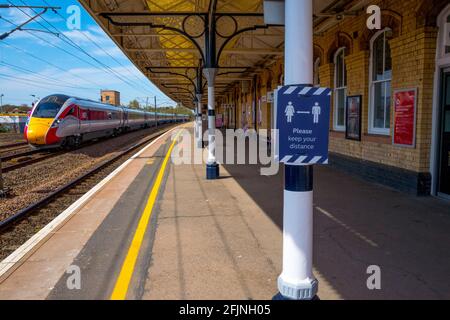 Covid 19 safety sign at Retford station the Grade II listed building in Nottinghamshire. Stock Photo