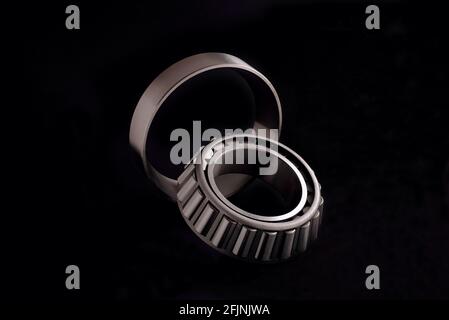 roller bearing on black background, blank for creativity close-up selective focus Stock Photo