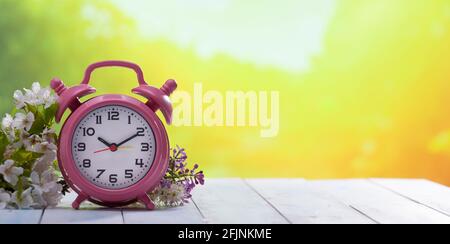Saving daylight, time change concept for summer days Stock Photo