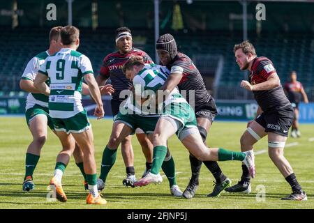 London, UK. 25th Apr, 2021. Maro Itoje #4 of Saracens wrestles Angus Kernohan #14 of Ealing Trailfinders to the ground in London, United Kingdom on 4/25/2021. (Photo by Richard Washbrooke/News Images/Sipa USA) Credit: Sipa USA/Alamy Live News Stock Photo