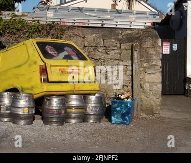 April 2021 - Only fools & horses three wheeler van crashed into a pub wall, used as advertising Stock Photo