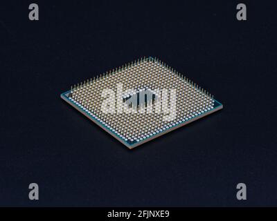 CPU processor chip pin side up isolated on black Stock Photo