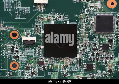 Close up of electronic components on laptop motherboard. Stock Photo