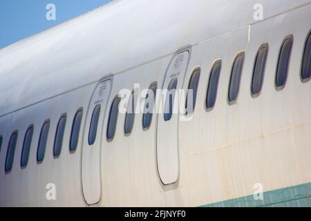 Emergency Exit Hatches And Window Ports On Passenger Plane Stock Photo