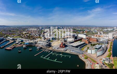 Panoramic aerial view of Cardiff Bay on a sunny day with the city centre in the background. Stock Photo