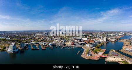 Panoramic aerial view of Cardiff Bay on a sunny day with the city centre in the background. Stock Photo