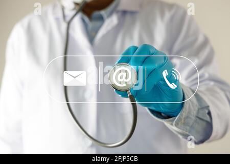 doctor  show plese Contact Us line contact hand telephone  email address on Website page contact us or e-mail Stock Photo
